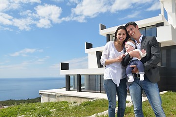 Image showing happy young family at home