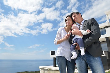 Image showing happy young family at home