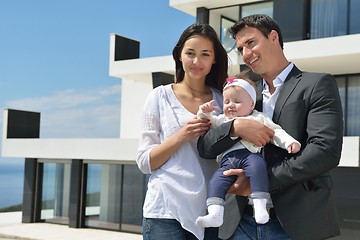 Image showing happy young family at home