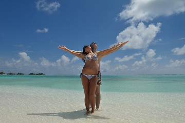 Image showing happy young couple have fun on beach