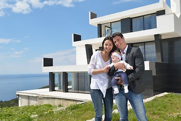 Image showing happy young family at home