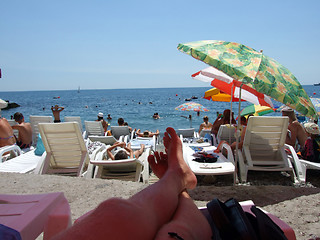 Image showing Typical kind of a popular sea resort eyes having a rest