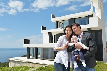 Image showing happy young family at home