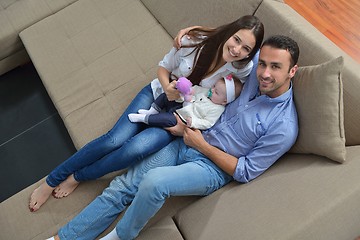 Image showing happy young family at home