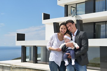 Image showing happy young family at home