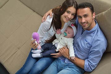 Image showing happy young family at home