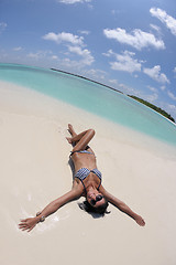 Image showing beautiful young woman  on beach have fun and relax