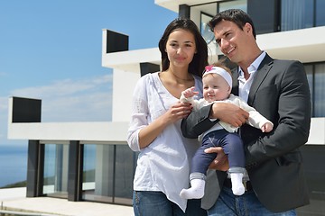 Image showing happy young family at home