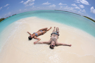 Image showing happy young couple have fun on beach