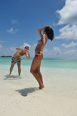 Image showing happy young couple have fun on beach