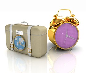 Image showing Suitcases for travel and clock