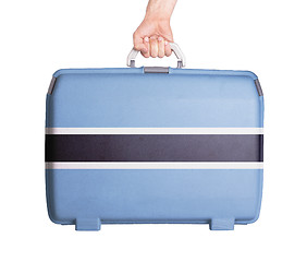 Image showing Used plastic suitcase with stains and scratches