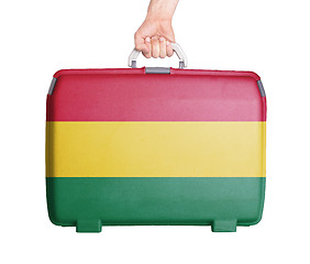 Image showing Used plastic suitcase with stains and scratches