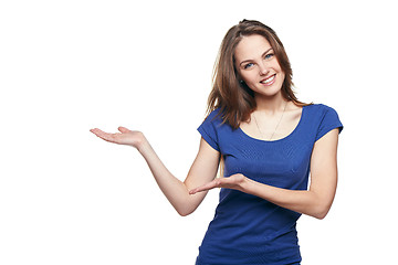 Image showing Smiling woman showing copy space