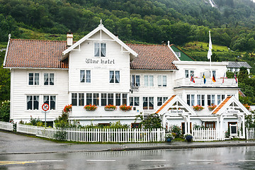 Image showing Old white wooden hotel in Utne, Norway