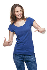 Image showing Smiling woman pointing at herself