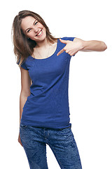 Image showing Smiling woman pointing at herself