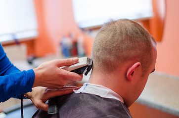 Image showing hairdresser shape man haircut with clipper  