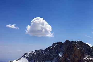 Image showing Blue sky with clouds and snow rocks