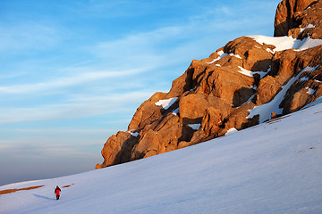 Image showing Hiker at sunrise mountains