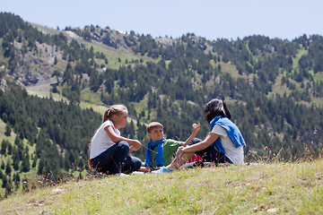 Image showing Family relaxing in the mountain