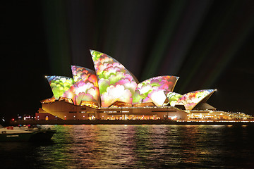 Image showing  Sydney Opera House covered in masses of flowers during Vivid Sy