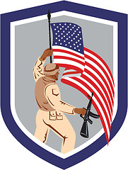 Image showing Soldier Military Serviceman Holding Flag Rifle Shield