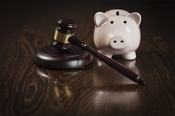 Image showing Gavel and Piggy Bank on Table