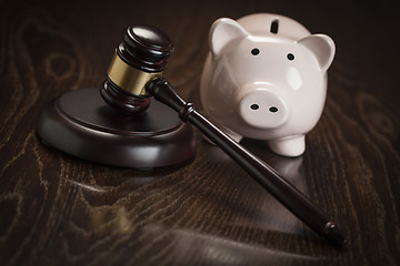 Image showing Gavel and Piggy Bank on Table