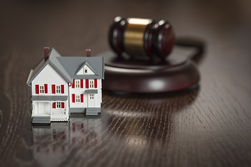 Image showing Gavel and Small Model House on Table