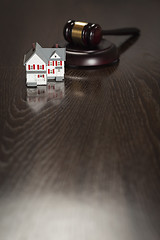 Image showing Gavel and Small Model House on Table