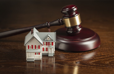 Image showing Gavel and Small Model House on Table