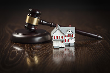 Image showing Gavel and Small Model House on Table