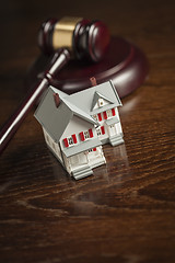 Image showing Gavel and Small Model House on Table