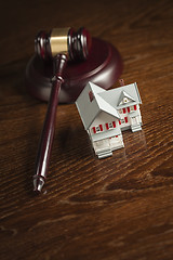 Image showing Gavel and Small Model House on Table