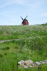 Image showing Landscape with cow parsley and an old wooden windmill