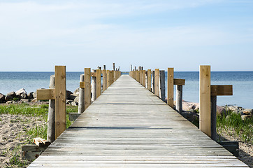 Image showing Wooden bath pier by the coast