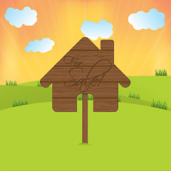 Image showing Cool wooden house sign