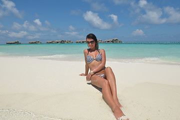 Image showing beautiful young woman  on beach have fun and relax