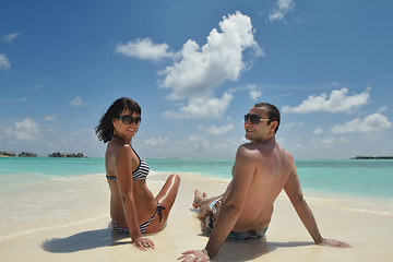 Image showing happy young couple have fun on beach