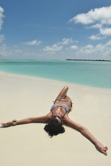 Image showing beautiful young woman  on beach have fun and relax