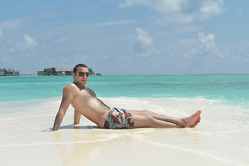 Image showing beautiful young woman  on beach have fun and relax