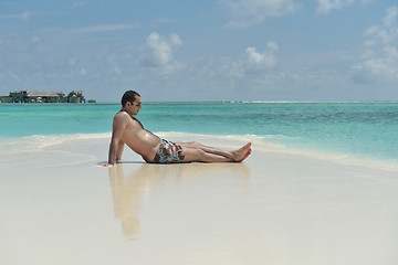 Image showing beautiful young woman  on beach have fun and relax