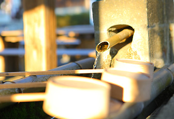 Image showing Bamboo ladle in japanese temple 