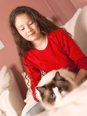 Image showing young girl with her cat