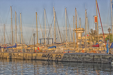 Image showing Sailing and engine boats in the harbour channel