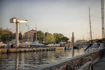 Image showing Sailing and engine boats in the harbour channel