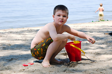 Image showing Playing in the sand