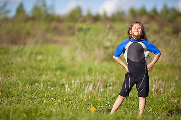 Image showing Portrait of little girl in wetsuit