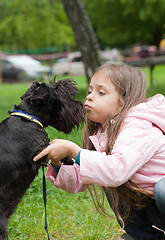 Image showing Little girl and her dog